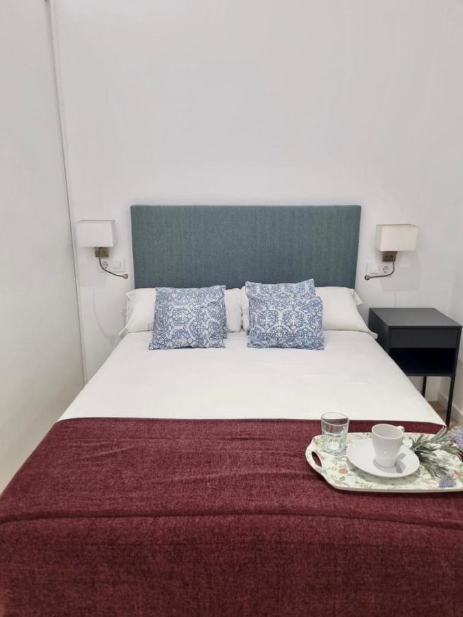 Apartamentos Rg Hospital Valme Sevilla Buitenkant foto