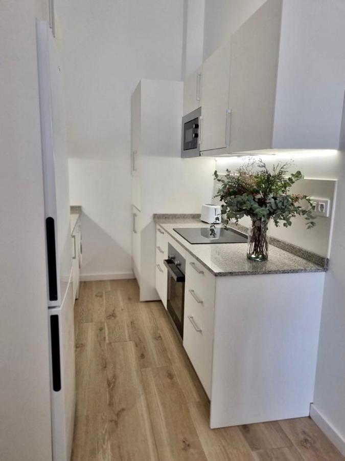 Apartamentos Rg Hospital Valme Sevilla Buitenkant foto